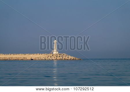 Lighthouse on a long seashore