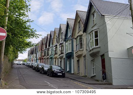 Street View Of Houses On A Steep Hil