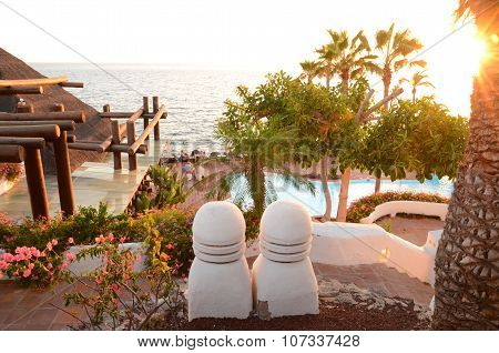 Picturesque beach club at sunset in Costa Adeje on Tenerife, Spain