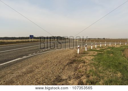Crossroads, Blue Sky And Greean Grass