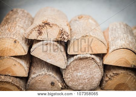 Stack Of Firewood Decorated In Garden