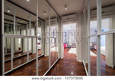 Modern Corridor Interior With Mirror Wardrobe Doors