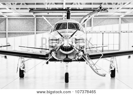 Single Turboprop Aircraft Pilatus Pc-12 In Hangar. Stans, Switzerland, 29Th November 2010.