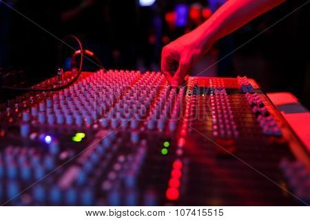 Hand Of Soundman On The Console