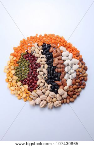 assorted beans arranged in a round shape