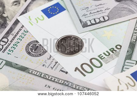 Ruble Coin Lying On Top Of Banknotes