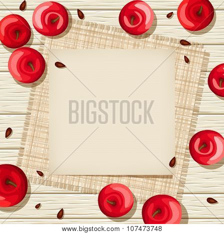 Beige card on a wooden background with red apples and sacking. Vector illustration.