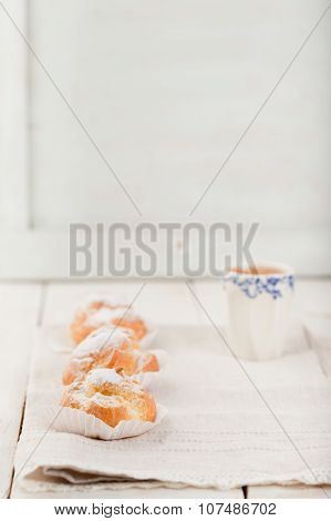Profiteroles, choux with a custard cream. Dessert