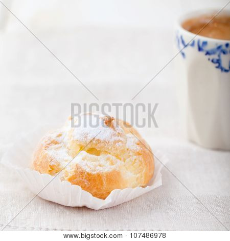 Profiteroles, choux with a custard cream. Dessert