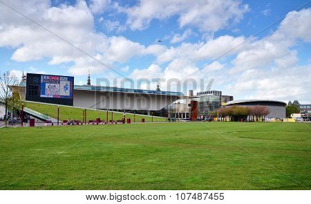 Amsterdam, Netherlands - May 6, 2015: Tourist Visit Stedelijk Musem And Van Gogh In Amsterdam