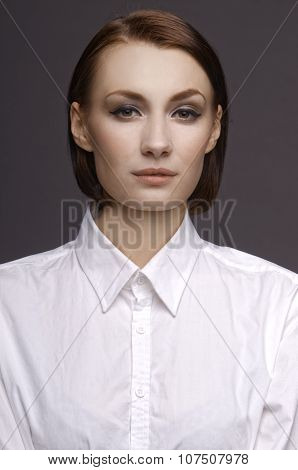 Business lady after work posing in front of the camera.