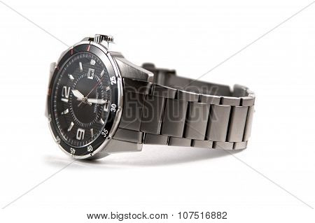 Metal clock on white background