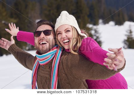 portrait of happy young romantic tourist  couple outdoor in nature at winter vacation