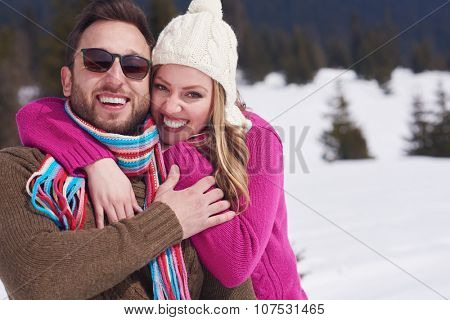 portrait of happy young romantic tourist  couple outdoor in nature at winter vacation