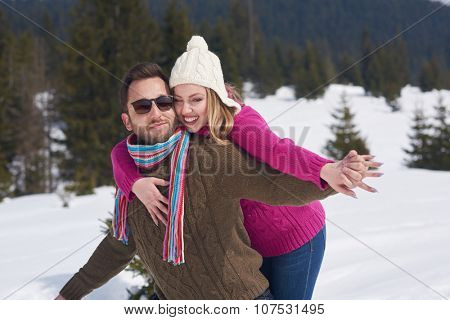 portrait of happy young romantic tourist  couple outdoor in nature at winter vacation