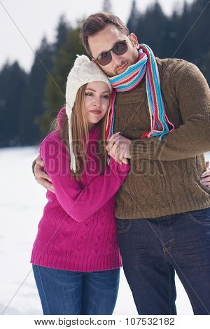 portrait of happy young romantic tourist  couple outdoor in nature at winter vacation