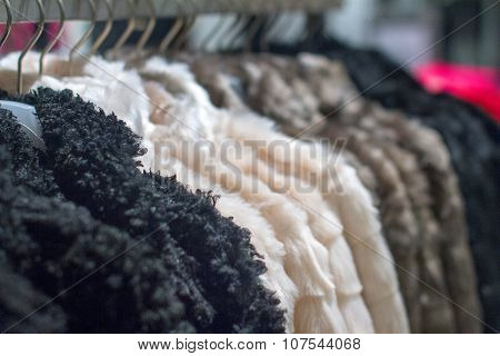 Winter Coat Hanging On The Rack In The Store