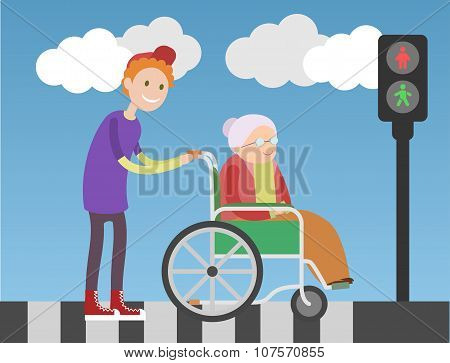 Kind boy helps old lady in wheelchair.