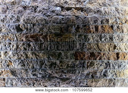 picture mof a stone wall illuminated with led light