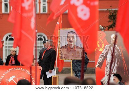 Orel, Russia - November 7, 2015: Communist Party Meeting. Stalin Portrait, Red Flags, Lenin Portrait