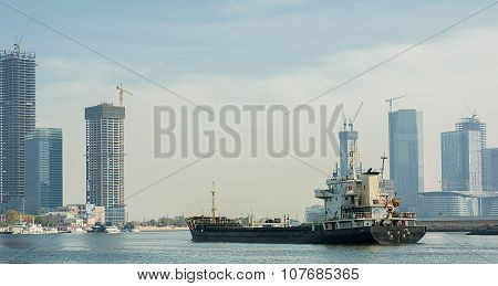 Cargo Ship Is Sailing On Haihe Sea Around  Tianjin The Bun Garden.