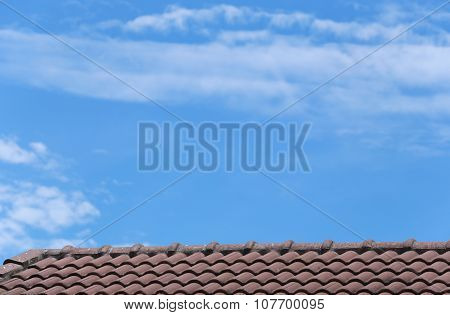 House Roof And Blue Sky.