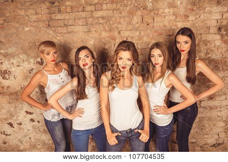 Confident Young Women With Red Lips Wearing A Dress Code