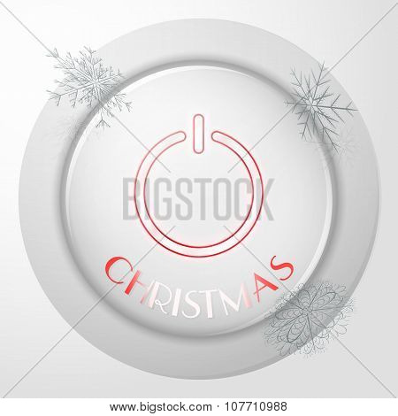 Christmas power button with reflection in a silver cover
