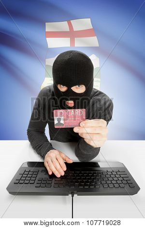 Hacker With Canadian Province Flag On Background Holding Id Card In Hand - Alberta