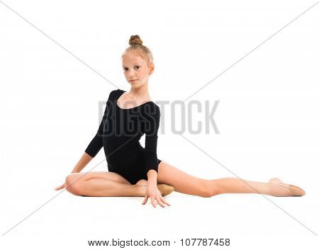 little gymnast doing exercise with skipping rope isolated on white background