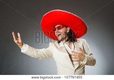 Person wearing sombrero hat in funny concept