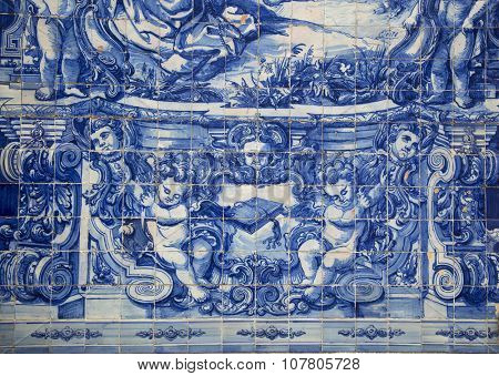 PORTO-PORTUGAL NOVEMBER 4, 2015:  Detail of Santa Catarina chapel in Porto built in the18th century, the facades are completely covered tile panels in blue and white painted in 1929 by Eduardo Leite.