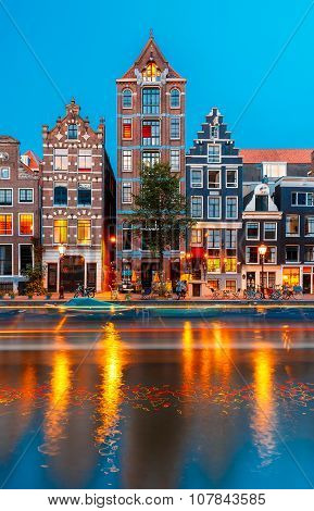 Night city view of Amsterdam canal Herengracht
