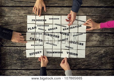 Group Of Six Businesspeople Creating Business Strategy