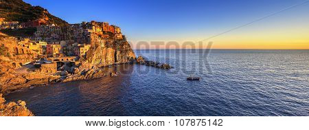 Manarola Village Panorama, Rocks And Sea At Sunset. Cinque Terre, Italy