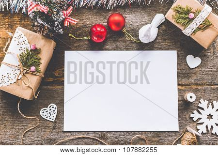 Cute vintage christmas new year gifts mock up on wooden background.