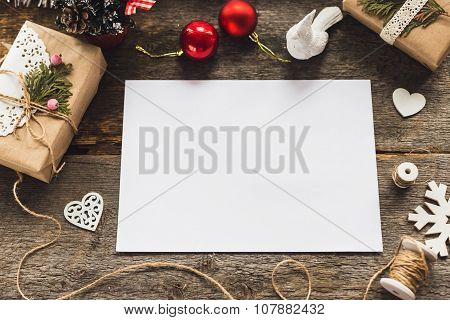 Cute vintage christmas new year gifts mock up on wooden background.