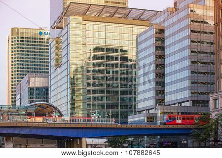 LONDON, UK - SEPTEMBER 9, 2015: DLR train running through the  Canary Wharf business and banking ari