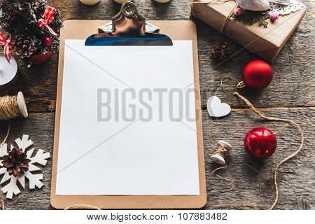 Cute vintage christmas new year gifts mock up on wooden background.