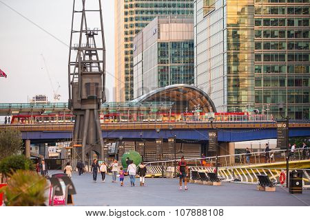 LONDON, UK - SEPTEMBER 9, 2015: DLR train running through the  Canary Wharf business and banking ari