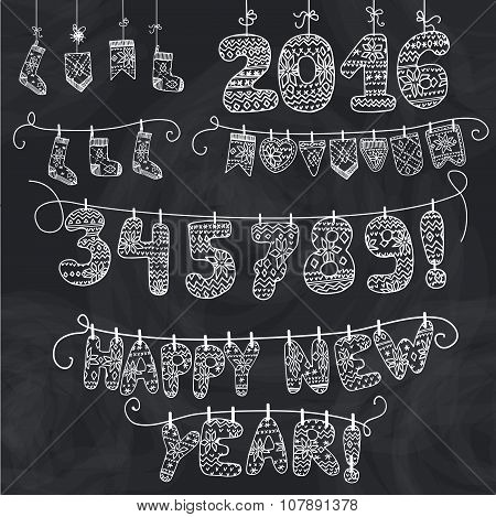 New year garland.Knitted numbers,socks,letters.2016.Chalkboard