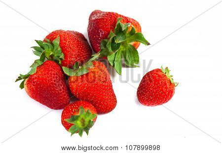 big red juicy rich strawberries with pedicle