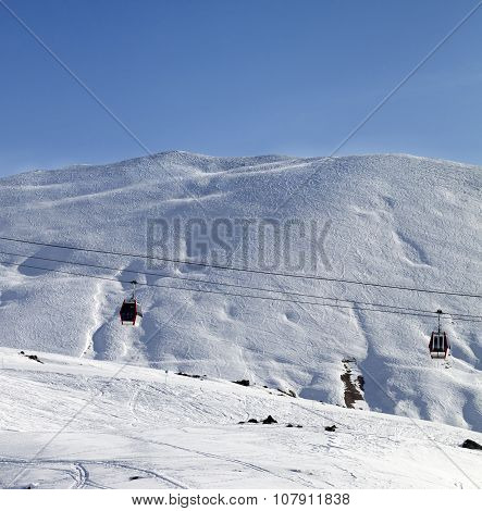 Gondola Lifts And Ski Slope At Nice Sun Morning