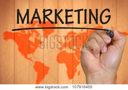 Hand Writing Marketing Over Blur World Background
