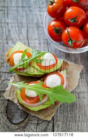 Avocado mozzarella and tomato bruscetta
