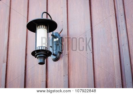 Lamp Decorated On Wooden Wall