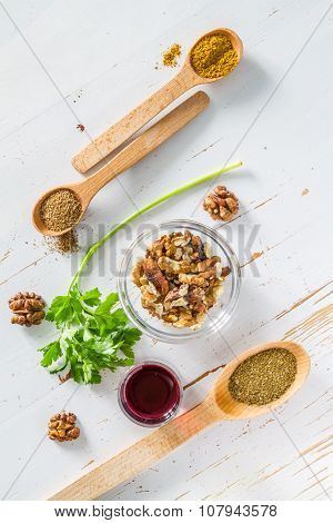 Georgian sauce ingredients on white wood background