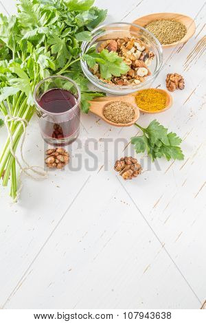 Georgian sauce ingredients on white wood background