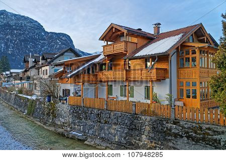 Typical wooden chalet in Garmisch-Partenkirchen. It is an idyllic mountain resort town in the valleys of the Bavarian Alps beneath the towering Zugspitze peak
