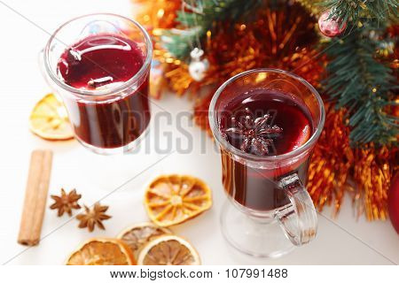 mulled wine with decorated christmas tree